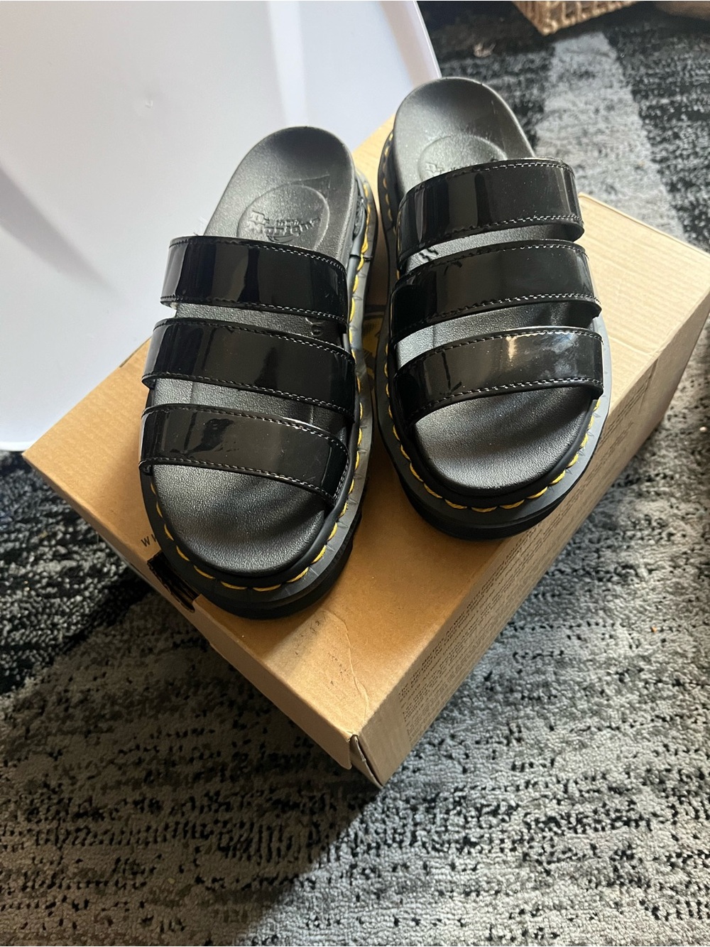 Dr. Martens Black Triple-Strap Patent Slide Sandals with Yellow Stitching